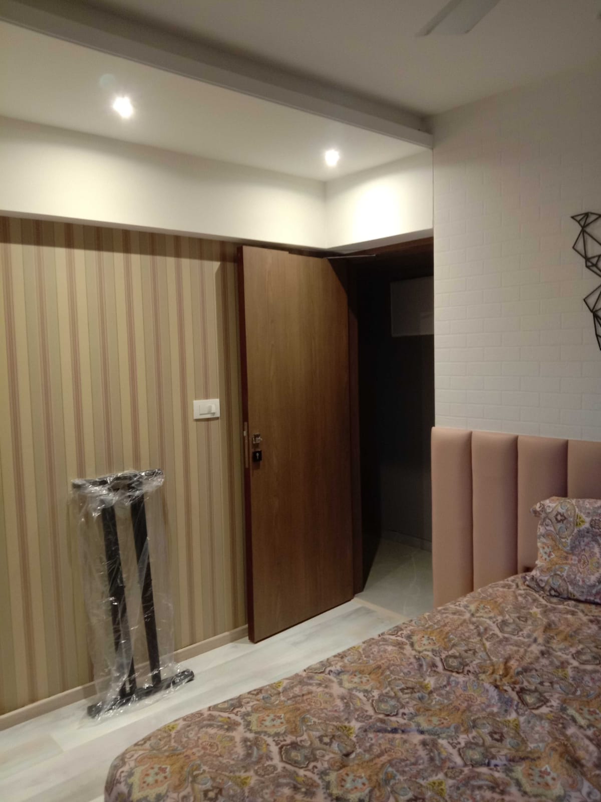 Minimalist Bedroom Layout with Warm Ambient Lighting & Suede Wall Panelling - Execution #